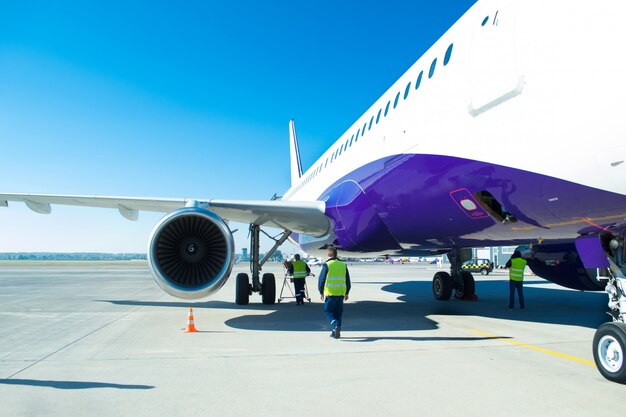 Turbine of big passenger plane that waiting for departure in airport