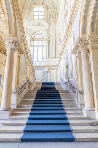 TURIN ITALY  CIRCA JUNE 2021 The most beautiful Baroque staircase of Europe located in Madama Palace Palazzo Madama Interior with luxury marbles windows and corridors