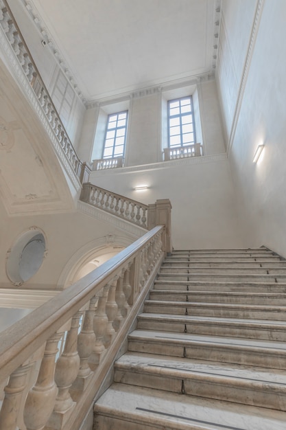 TURIN, ITALY - CIRCA MAY 2021: luxury staircase made of marble in an antique Italian palace