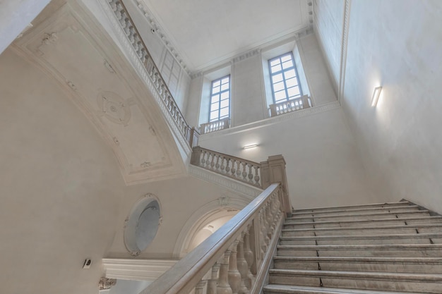 TURIN, ITALY - CIRCA MAY 2021: luxury staircase made of marble in an antique Italian palace