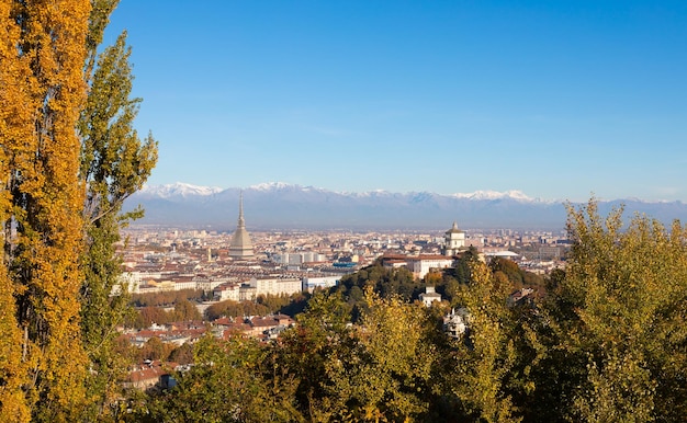 Turin panorama with Alps and Mole Antonelliana Italy Skyline of the symbol of Piedmont Region with Monte dei Cappuccini Cappuccini's Hill Sunrise light Autumn