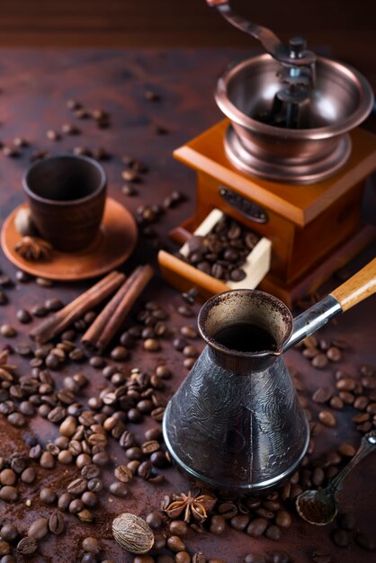 Turka with coffee on the table next to coffee beans