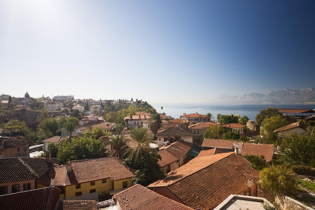 Turkey, Antalya, rooftops of Old Town, Mediterranean Sea on background