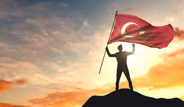 Turkey flag being waved by a man celebrating success at the top of a mountain 3D Rendering