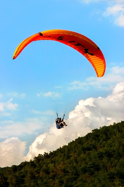 Turkey Oludeniz  June 23 2015 The flight of paragliders in the highlands Paragliding