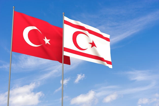 Turkey and Turkish Republic of Northern Cyprus flags over blue sky background. 3D illustration