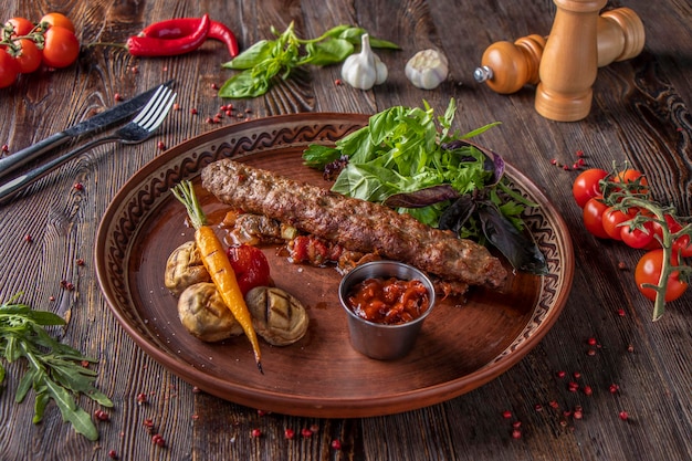 Turkish and Arabic Traditional Ramadan mix kebab plate Kebab beef with baked vegetables mushrooms