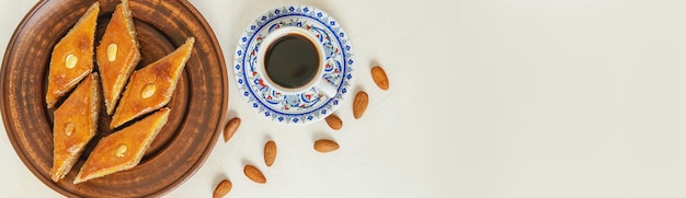 Turkish coffee and baklava on a light background. Selective focus. food.