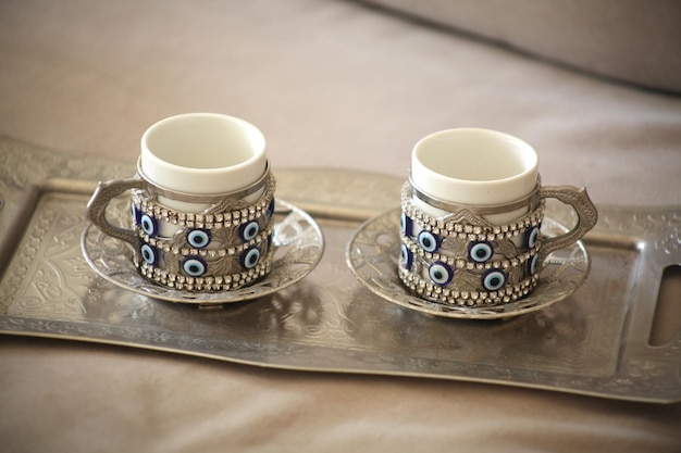 Turkish coffee cups in a silver set evil eye protection