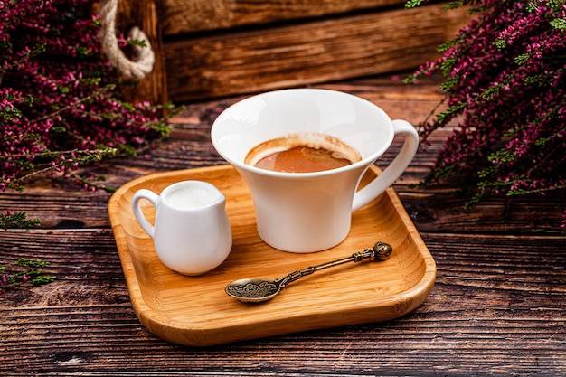 Turkish cuisine concept. Americano coffee with milk. Beautiful serve in the restaurant. top view