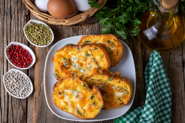 Turkish Egg Breads. It is called "Yumurtali Ekmek" in Turkish. French Toast. Turkish and Arabic Traditional Breakfast Baked or Fried Egg Bread. Egg bread with cheese and parsley.