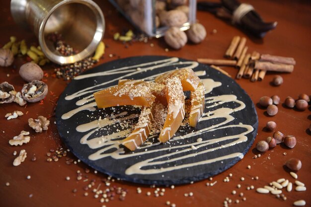 Photo turkish pumpkin dessert with tahini tahinli kabak tatlisi