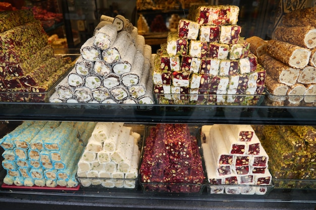 Turkish sweets of different taste and colour in the window shop