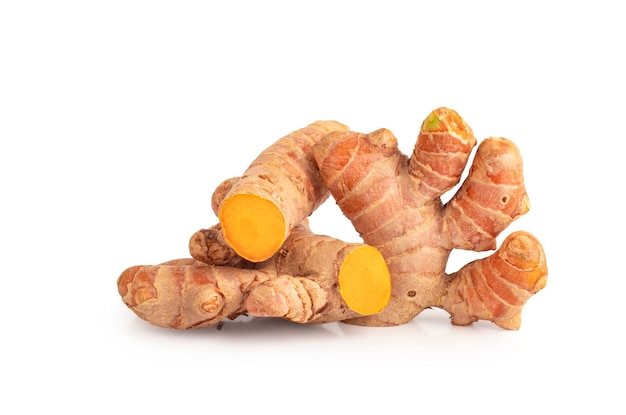 Turmeric Curcuma longa Linn rhizome root sliced isolated on white background with Clipping Path