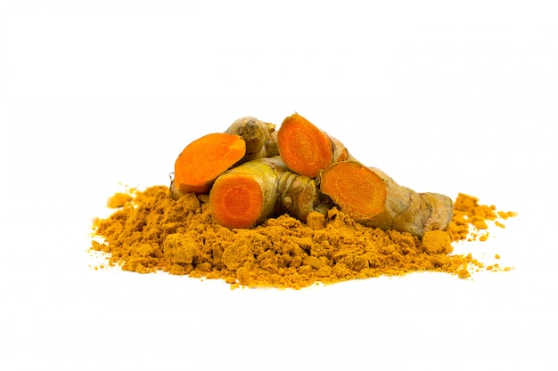 Turmeric powder and turmeric isolated on white 