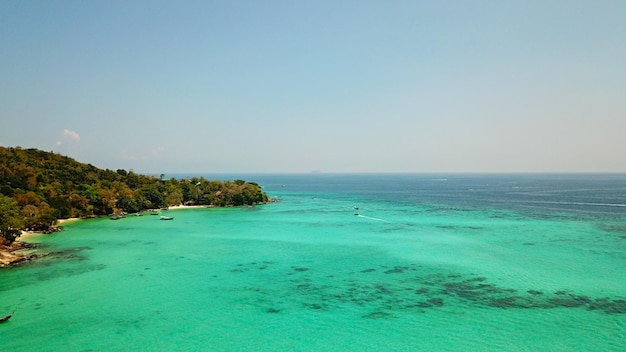 Turquoise clear water yachts boats floating