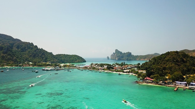 Turquoise clear water yachts boats floating