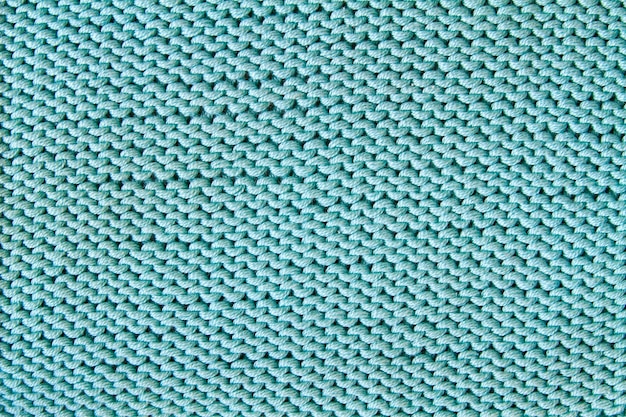 Turquoise knitted textured background