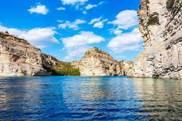 Turquoise mountain lake among the rocks