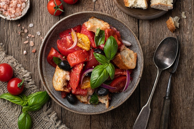 Tuscan salad panzanella with tomatoes and bread italian cuisine dish view from above