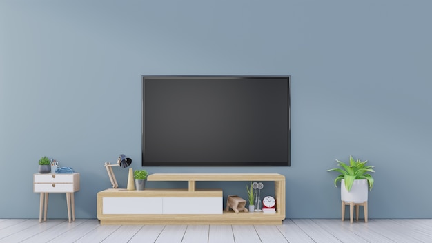 TV on cabinet in empty interior room ,blue wall with wood shelf