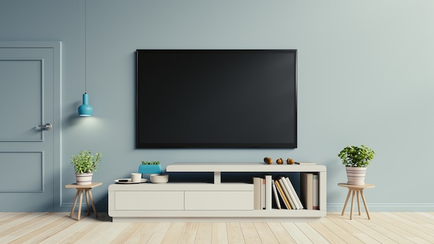 TV on the cabinet in modern living room have plants and book on blue wall background,3d re