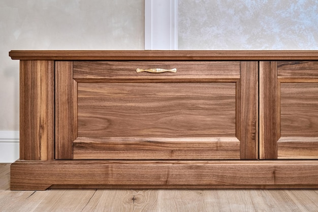 TV cabinet of veneer and solid walnut