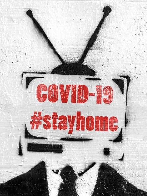 Photo tv head with hashtag stayhome