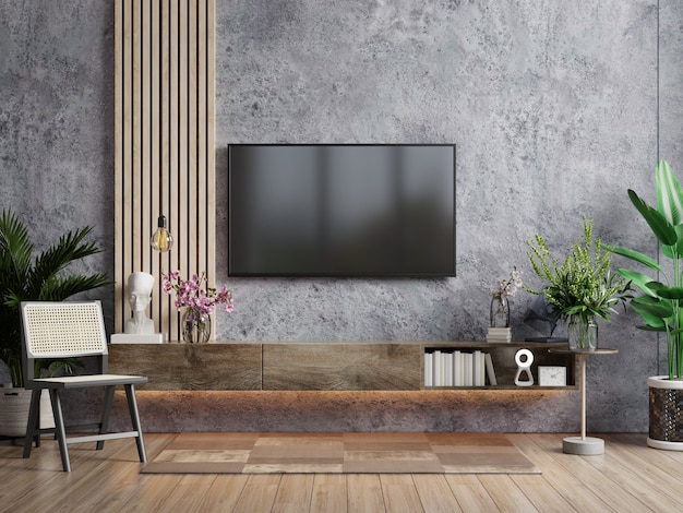 a TV in modern living room with armchair and plant on concrete wall background,3d rendering