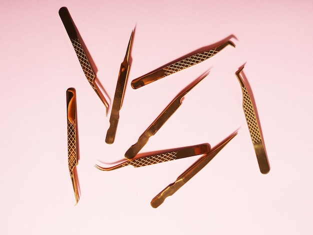 Tweezers of different shapes for eyelash extensions, artificial eyelash masters. tweezers for working with eyelashes and eyebrows