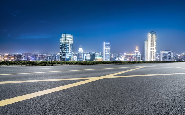 Twilight Urban Skyline with Empty Road