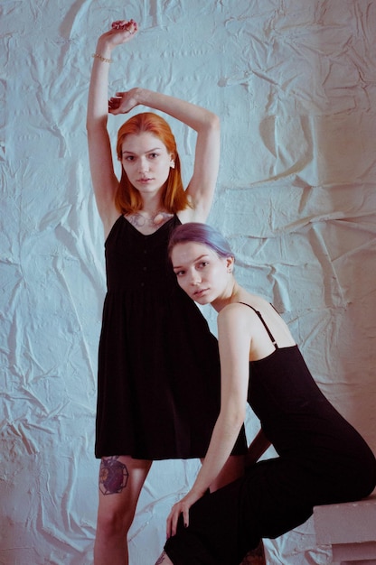 Twins in black dresses