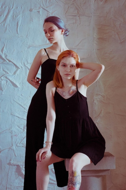 Twins in black dresses