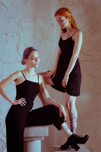 Twins in black dresses