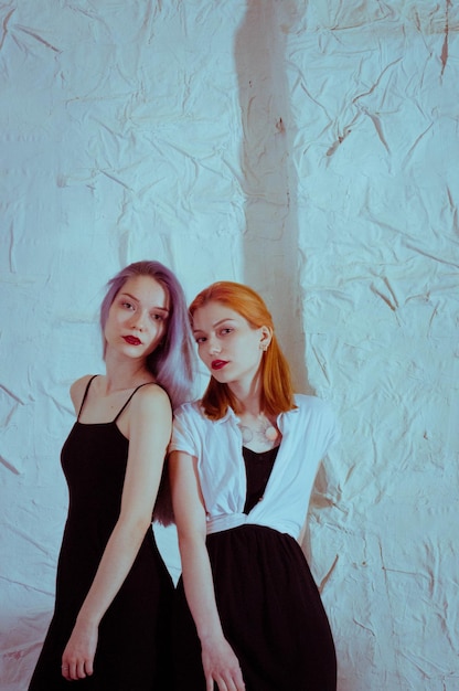 Twins in black dresses