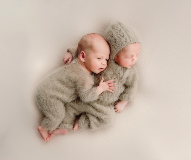 Twins newborn studio portrait