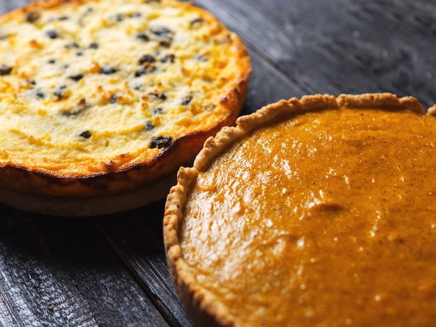 Two autumnal pie. Homemade cake. Traditional pumpkin pie for thanksgiving and pumpkin casserole