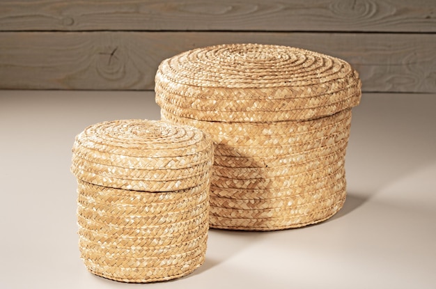 Two baskets woven from rattan for storing household items