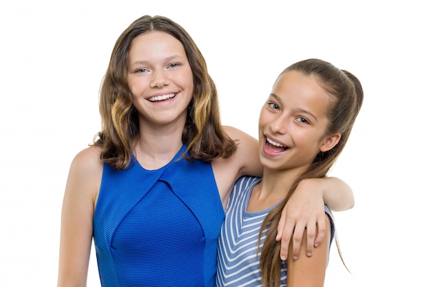 Two beautiful girls smile with perfect white smile