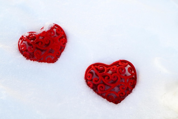 two beautiful red hearts on a white background