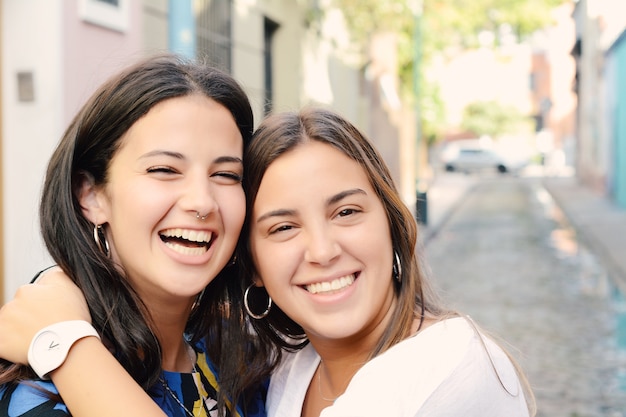 Two best friends, smiling and having fun together.