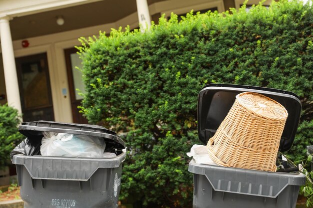 Two bins with a lid that says " dumplings " on the side.