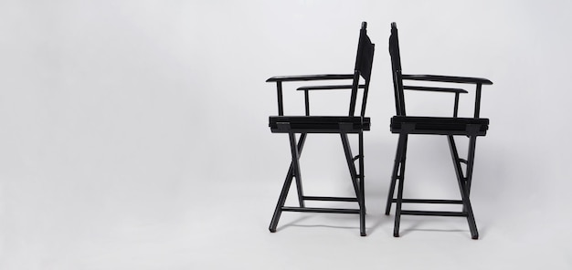 Two Black director chair isolated on white background