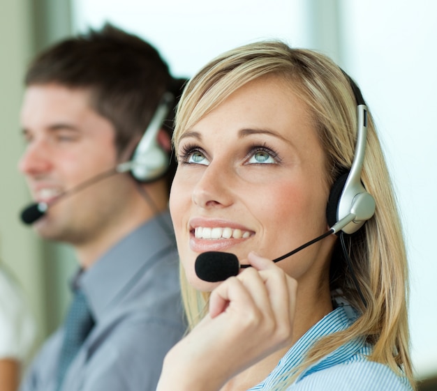 Two businesspeople with headsets