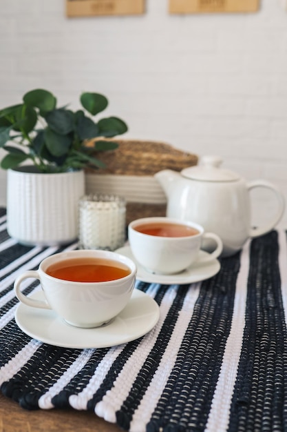 Two cups of tea tea drinking in Scandinavian cuisine Beautiful cozy home interior photography