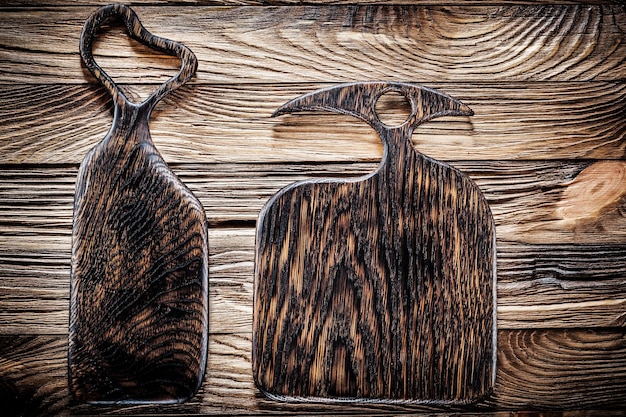 Two dark wood serving and cutting board