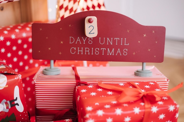 Two days left until christmas closeup of desk with countdown in winter holiday fastive decor at home