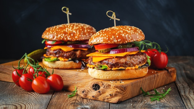 Two delicious homemade burgers of beef.