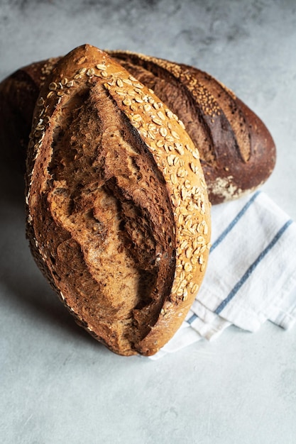 Two different sourdough bread on a gray background