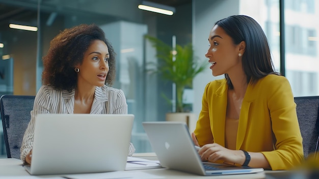 Two Diverse Businesswomen Having a Discussion in an Office